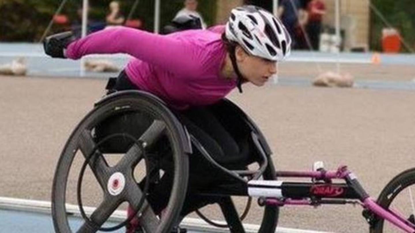 Carly Tait racing in her wheelchair