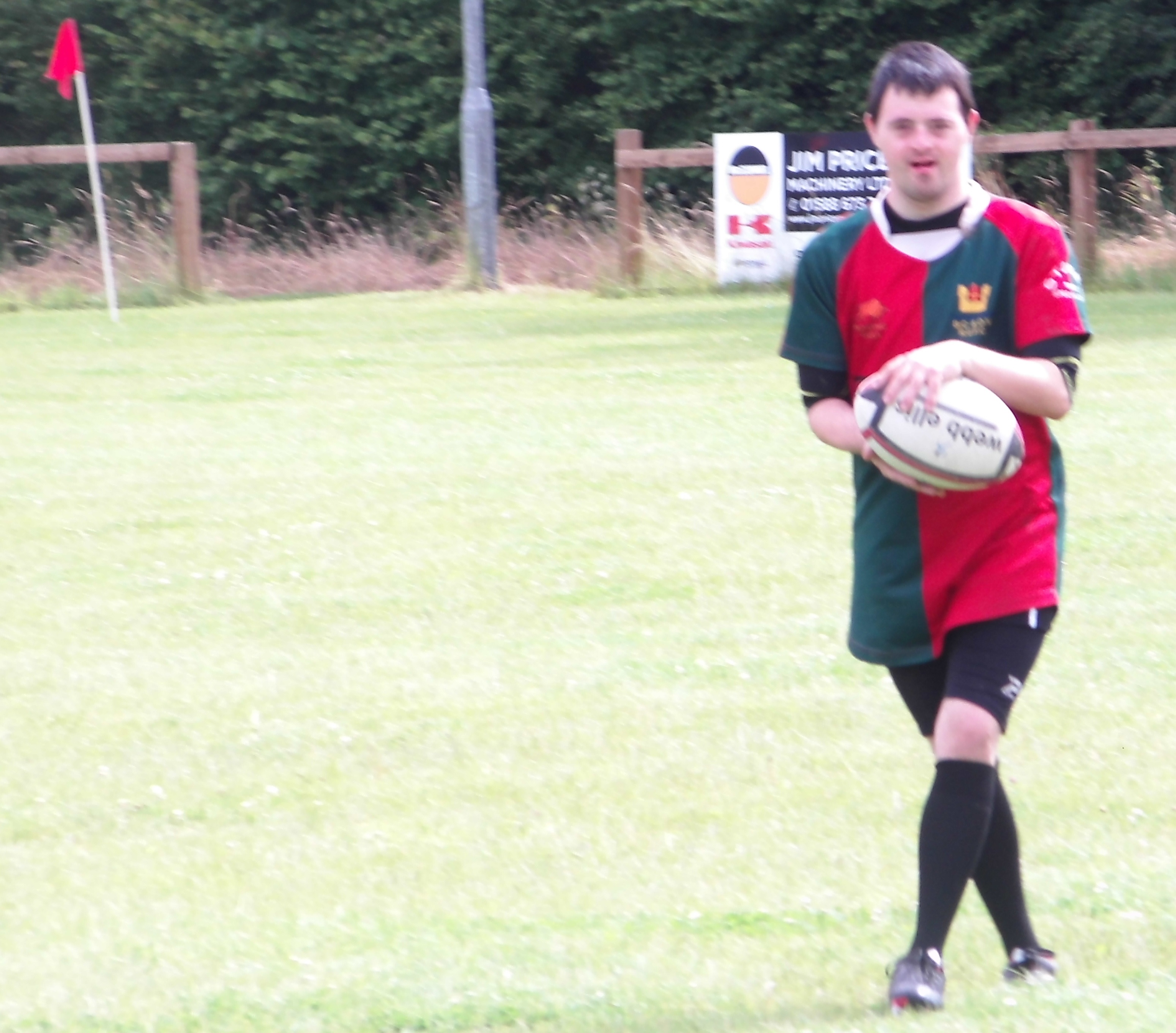 Zac playing rugby