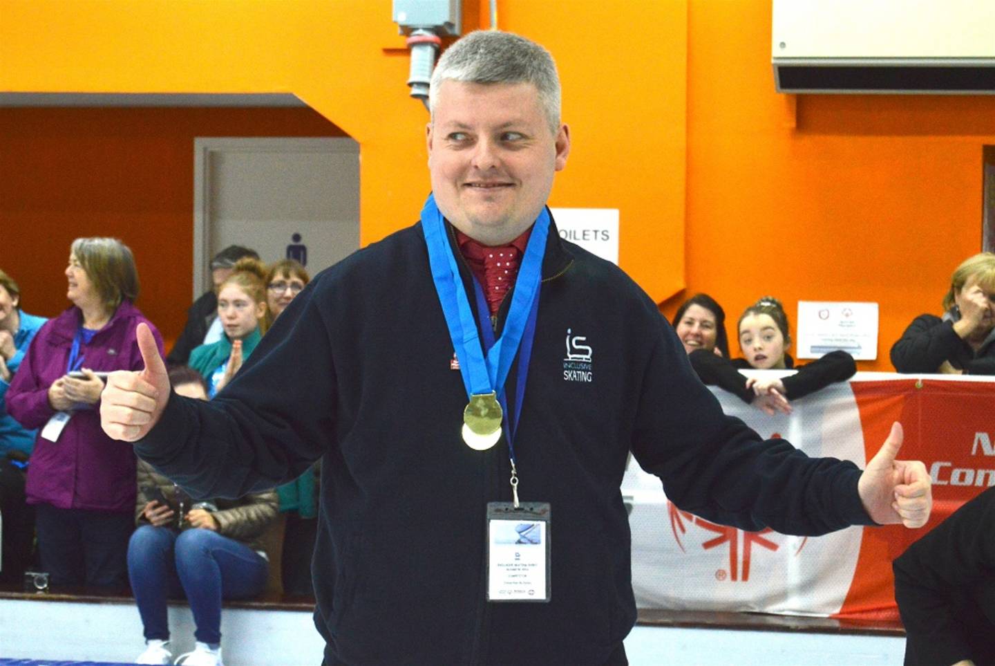 Image shows Jonathan smiling with medal at SOGB event 