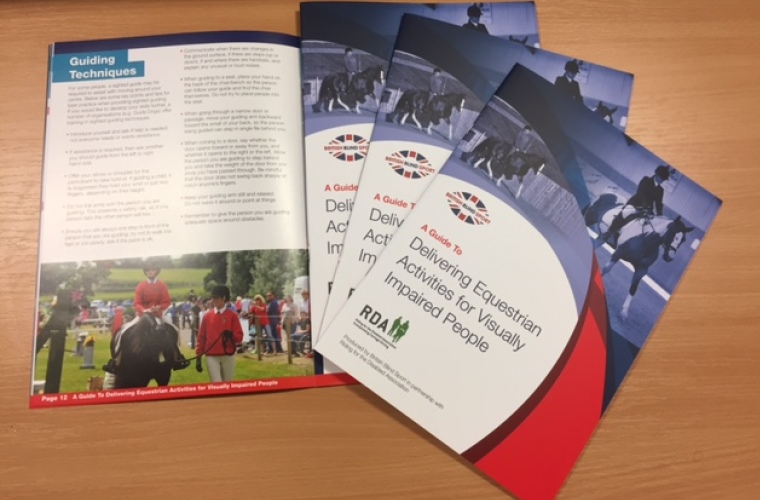 Image shows printed copy of equestrian sport resource