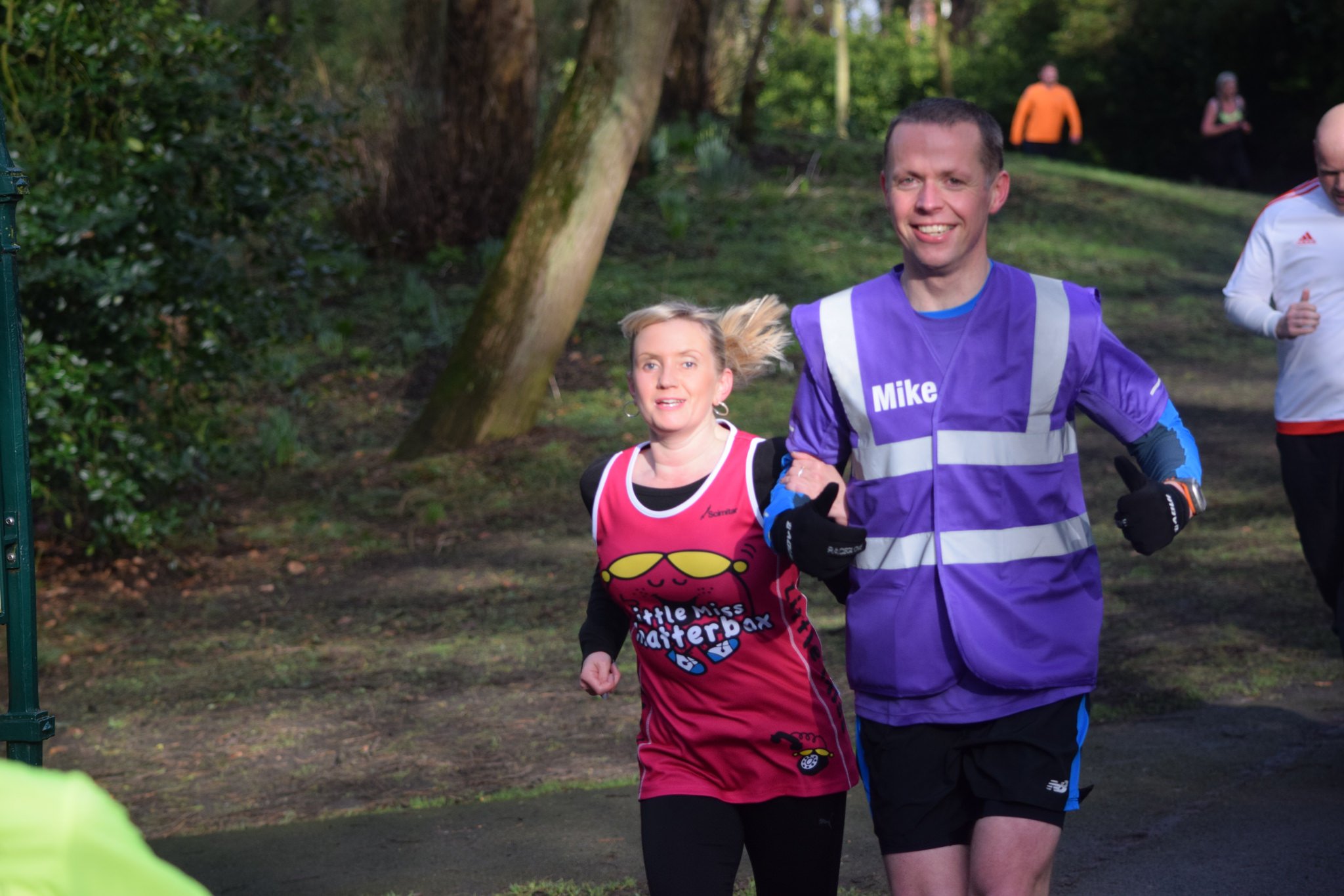 Kelly and Mike (guide) on a parkrun in Southport