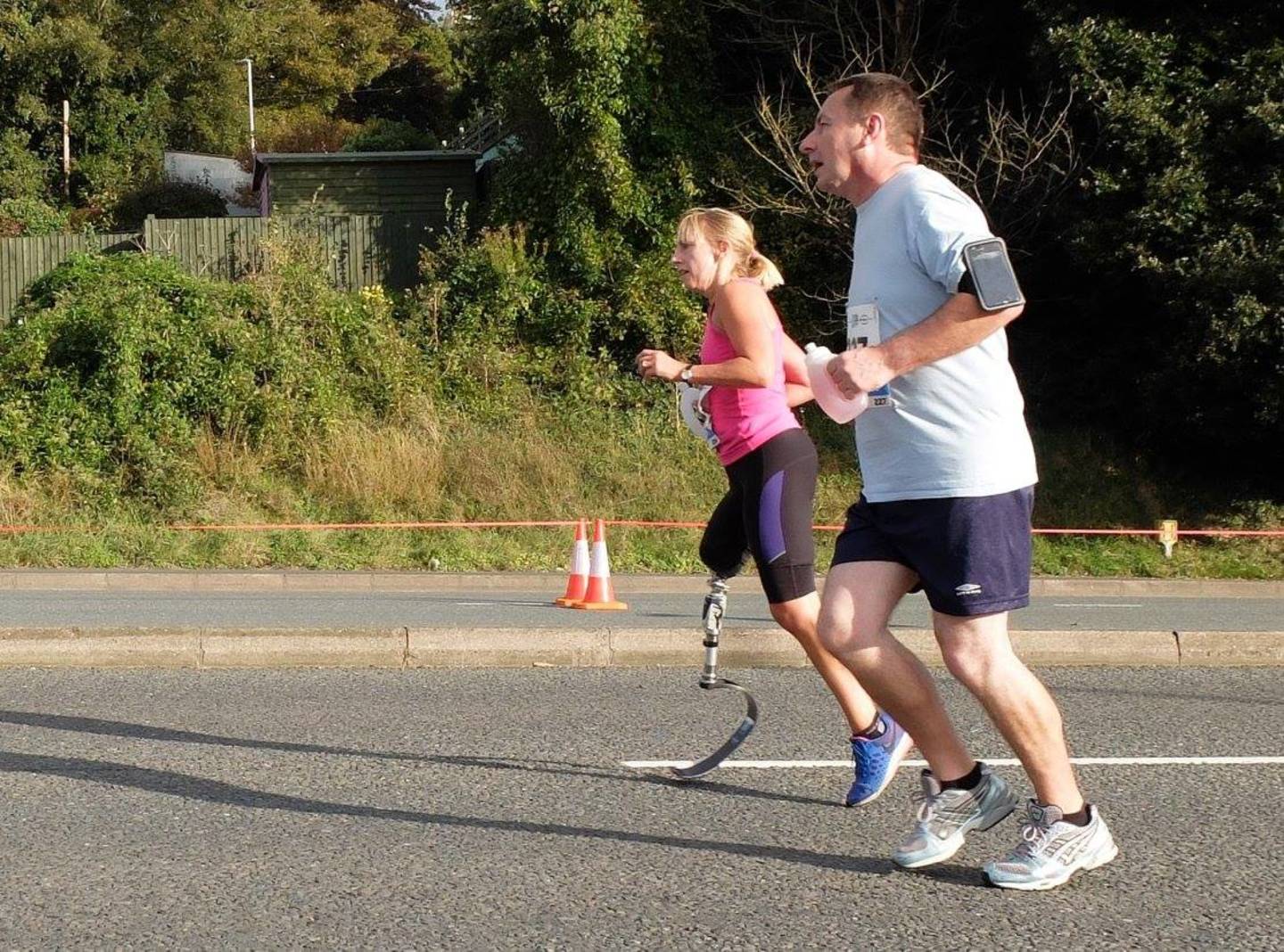Debbie Squance running with her husband