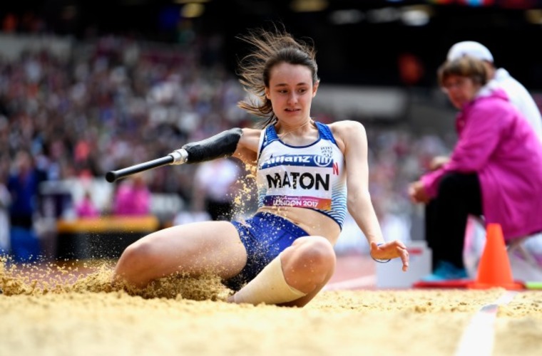 Arm amputee Polly Maton landing in long jump pit at World Para Athletics Championships