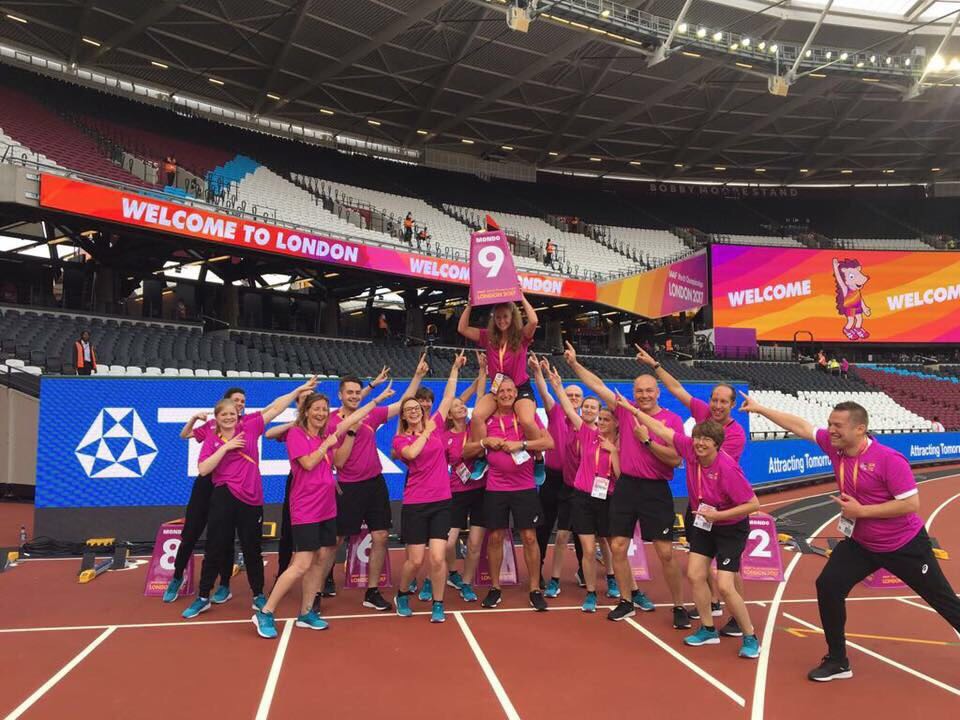 Talia Jones and other volunteers on the World Para Athletics Championships 2017 track