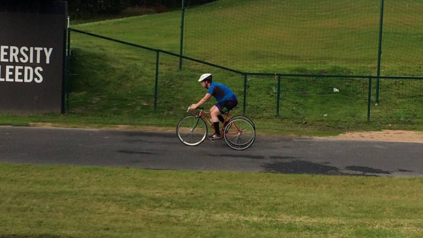 Geoff riding tricycle on closed road circuit track